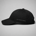 Black baseball cap with black tonal writing on a white background